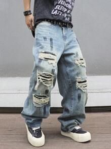 Manfinity EMRG Jeans de mezclilla de estilo callejero para hombres con bolsillo de contraste y efecto desgastado