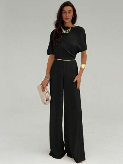 Aloruh New Design Minimalist Solid Color Apricot Pleated Decor Asymmetrical Shoulder Black Jumpsuit, Sexy High Waist Wide Leg Pants