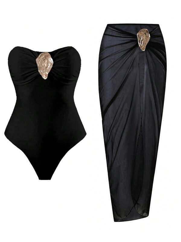 Swim Oasis Beach Summer Outfits For Women: Textured Solid Color Bandeau One-Piece Swimsuit With Metal Accents, Paired With Solid Color Mesh Cover-Up Maxi Skirt And Metal Accessories