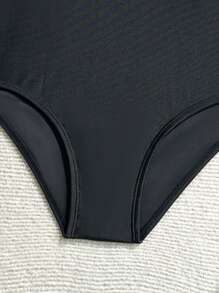 Tween Mädchen Badeanzug für die Übergangsphase, schwarze einfarbige bedruckte Langarm-Ausführung