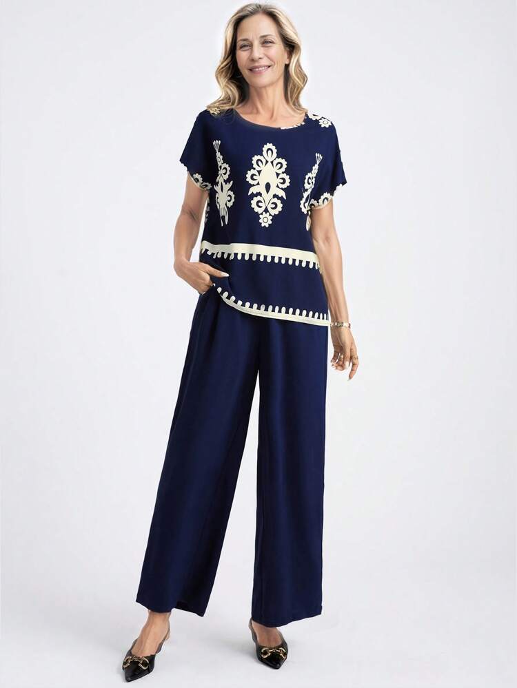 Ensemble de 2 pièces avec chemise à manches courtes à col rond et imprimé floral et pantalon, tailles plus, tenue de vacances, tenue décontractée de campagne pour femme, simple et pour un port quotidien, tenue de vacances, tenue d'été pour femme, tenue de bureau, tenue de vacances, tenue d'été bohème pour festival, tenue de vacances