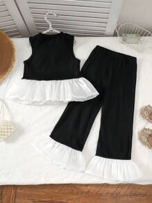 Set de 2 piezas de moda elegante y dulce para niñas de 4 a 7 años, que incluye 1 pieza de blusa sin mangas con panel de punto negro, volantes de organza brillante color albaricoque y detalles florales, y 1 pieza de pantalón negro con cintura elástica y volantes, adecuado para primavera/verano, diario, exterior, viaje, eventos nocturnos, ceremonia y aniversario de cumpleaños