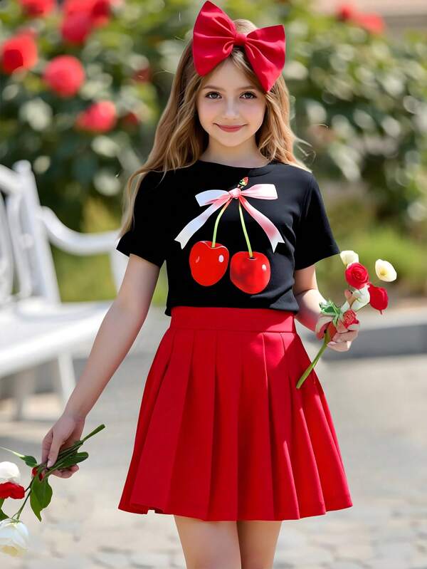 Set de 2 piezas: Blusa de manga corta y cuello redondo con estampado de cerezas y falda plisada, adecuado para niñas jóvenes en primavera y verano