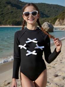 Tween Mädchen Badeanzug für die Übergangsphase, schwarze einfarbige bedruckte Langarm-Ausführung