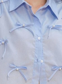 Aveloria GENKIRA Blouse ample à manches courtes style casual preppy, avec fleur en nœud de perle - Bleu azur - Voir 7