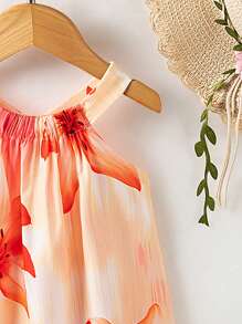 SHEIN Playful Pals Robe-camisole à col ras-du-cou imprimée de fleurs pour bébés filles. Les nouveaux produits pour le printemps, l'automne et l'été sont maintenant sur le marché. Elle est confortable, stylée, mignonne, douce, élégante, décontractée et convient aux vacances. C'est une pièce indispensable pour le port quotidien.