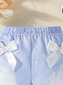 Pantalones cortos con lazo de impresión digital imitación de mezclilla para niñas pequeñas. Los nuevos productos para primavera, otoño y verano ya están en el mercado. Son cómodos, elegantes, lindos y sencillos, y son imprescindibles para el uso diario