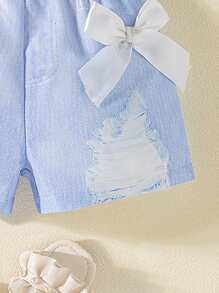 Pantalones cortos con lazo de impresión digital imitación de mezclilla para niñas pequeñas. Los nuevos productos para primavera, otoño y verano ya están en el mercado. Son cómodos, elegantes, lindos y sencillos, y son imprescindibles para el uso diario