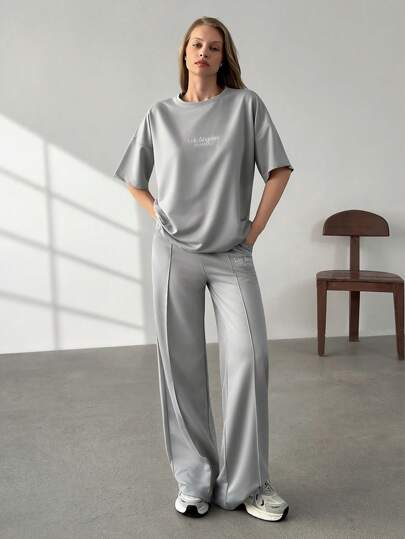 SHEIN Woman 2piece Outfits Co Ords Set Short Sleeve T-Shirt Round Neck Front Text Embroidery And Wide Leg Pants Lady Bottom Contrast Text Embroidery Detailed Solid Color Weekend Outfit Comfy Relax Fit Leisure Outfit