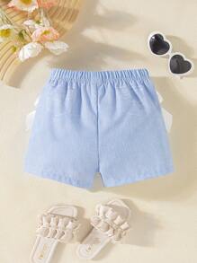 Pantalones cortos con lazo de impresión digital imitación de mezclilla para niñas pequeñas. Los nuevos productos para primavera, otoño y verano ya están en el mercado. Son cómodos, elegantes, lindos y sencillos, y son imprescindibles para el uso diario
