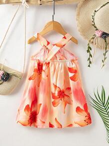 SHEIN Playful Pals Robe-camisole à col ras-du-cou imprimée de fleurs pour bébés filles. Les nouveaux produits pour le printemps, l'automne et l'été sont maintenant sur le marché. Elle est confortable, stylée, mignonne, douce, élégante, décontractée et convient aux vacances. C'est une pièce indispensable pour le port quotidien.