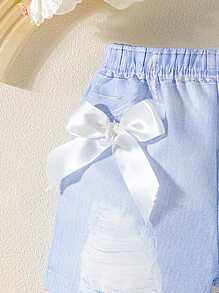 Pantalones cortos con lazo de impresión digital imitación de mezclilla para niñas pequeñas. Los nuevos productos para primavera, otoño y verano ya están en el mercado. Son cómodos, elegantes, lindos y sencillos, y son imprescindibles para el uso diario