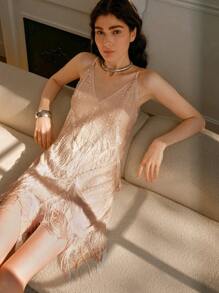 Uhlyne 女士 V 领无袖亮片流苏下摆连衣裙