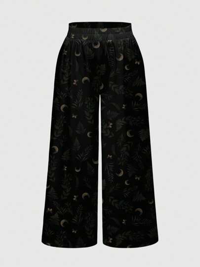 Pantalon ample de style boho noir pour femmes de grande taille, avec une impression de lune gothique mystérieuse et de feuille de plante