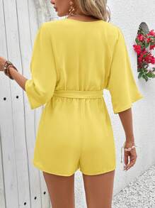 Vivid Eden 女式 V 领交叉裹身束腰花卉纹理面料休闲度假连体衣