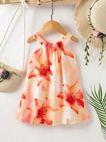 SHEIN Playful Pals Robe-camisole à col ras-du-cou imprimée de fleurs pour bébés filles. Les nouveaux produits pour le printemps, l'automne et l'été sont maintenant sur le marché. Elle est confortable, stylée, mignonne, douce, élégante, décontractée et convient aux vacances. C'est une pièce indispensable pour le port quotidien.