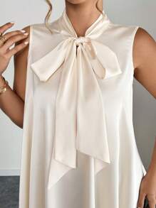 SHEIN Clasi Áo cánh không tay màu trơn cổ nơ rộng thanh lịch cỡ lớn cho nữ, thích hợp mặc hàng ngày, đi làm, đi chơi và hẹn hò - Màu be - Xem 3