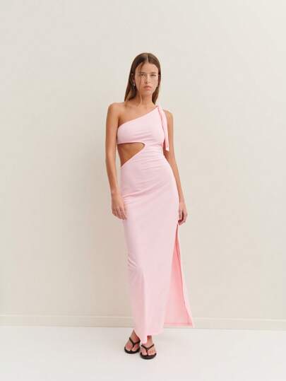 Nöista Asymmetric Long Dress With A Tie-Bow Shoulder Detail-Elevate Your Summer Tan With This Sophisticated Piece.