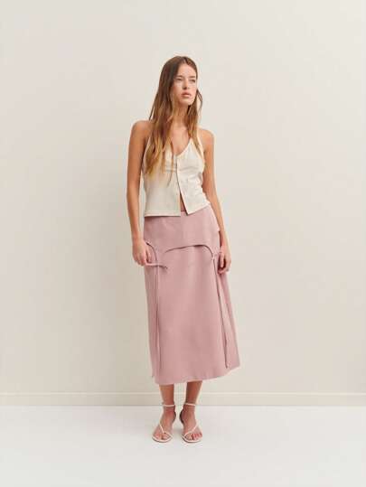 Nöista Midi Skirt With Bow Accents-Pair It With One Of Our Stylish Tops For A Playful Yet Sophisticated Summer Look.