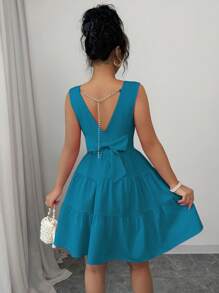 Elenzga Vestido corto de mujer de unicolor con cuello redondo, bajo con volantes, sin mangas y con amarre en la espalda - Azul - Ver 7