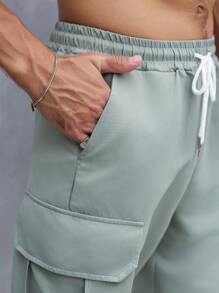 Manfinity Homme Men's Solid Color Drawstring Pocket Casual Cargo Shorts, Summer