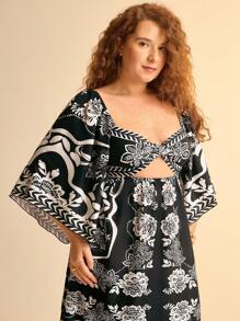 CAJUNI Damen Urlaub Boho tropischer Blumen Schwarz & Weiß Muster, luftig weites Maxikleid mit Ausschnitten, Große Größen