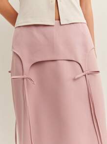 Nöista 带有蝴蝶结装饰的中长裙 - 搭配我们的时尚上衣，打造俏皮而精致的夏日造型。 - 中紫紅色 - 查看 4