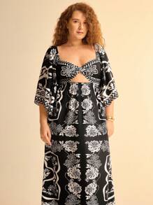 CAJUNI Damen Urlaub Boho tropischer Blumen Schwarz & Weiß Muster, luftig weites Maxikleid mit Ausschnitten, Große Größen