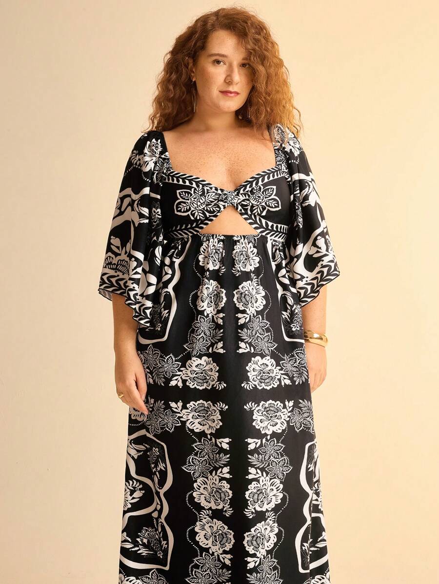 CAJUNI Damen Urlaub Boho tropischer Blumen Schwarz & Weiß Muster, luftig weites Maxikleid mit Ausschnitten, Große Größen