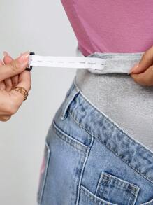 SHEIN Shorts vaqueros casuales para maternidad con cintura ajustable, bordado de lazo
