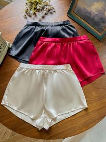 SilkySpell Set de 3 piezas de pantalones de pijama de satén con decoración de lazo en la parte trasera