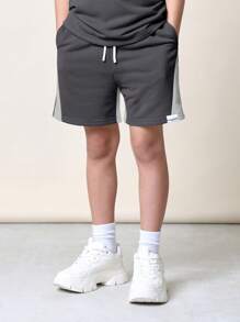 SUMWON Conjunto deportivo de dos piezas coordinado, camiseta de entrenamiento de manga corta con bolsillo y pantalones cortos de chándal con cordón, conjunto de ropa deportiva informal - Gris Oscuro - Ver 4