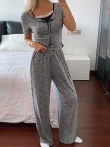 DAZY Juego de pijama para mujer de 2 piezas con estampado de lazos en todo el diseño de parte superior y pantalones