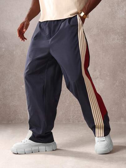 SUMWON 运动裤 优质性能 侧条纹 抽绳腰部 宽松版型 训练 锻炼 慢跑 活力生活方式 下装 防风裤