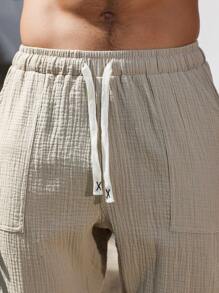 Manfinity Nomadique Pantalon en coton unicolore avec poches, mode pour l'été