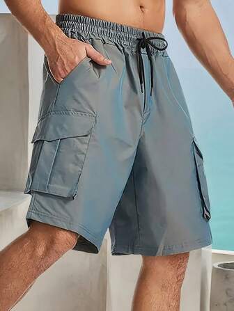 Manfinity Roughcore Pantalones cortos cargo casuales con cintura elástica y múltiples bolsillos, pantalones cortos para hombres con bolsillos