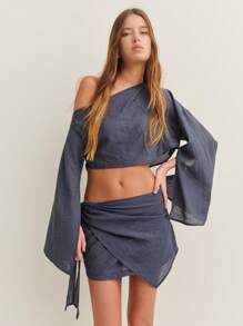 Nöista Conjunto de top corto con cuello asimétrico y mini falda a juego, perfecto para el verano. Ideal para fiestas, festivales y ropa de calle