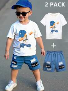 SHEIN 2pcs/Set Young Boy Funny Graphic Print Top And Distressed Shorts. The Pattern Is Fun And Lively, With Excellent Denim Washing Technique. The Stylish Design And Comfortable Crew Neck T-Shirt Make It Suitable For Summer. The Simple And Fashionable Design Showcases The Personalized Of Boys Aged 4-7 For Casual Daily Wear.