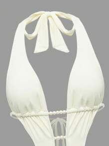 Swim Oasis Conjunto de traje de baño de mujer con falda de volantes decorada con perlas blancas y 3 flores color albaricoque, diseño elegante y casual para la playa - Beis - Ver 7