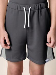 SUMWON Conjunto deportivo de dos piezas coordinado, camiseta de entrenamiento de manga corta con bolsillo y pantalones cortos de chándal con cordón, conjunto de ropa deportiva informal - Gris Oscuro - Ver 8