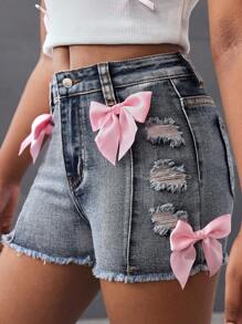 SHEIN Quần short denim co giãn màu xanh dương ôm sát, chất liệu mềm mại, thích hợp mặc hàng ngày, mùa hè, mùa xuân, đi lễ hội và đi biển, phù hợp cho bé gái tuổi teen, phong cách thường ngày Y2K, rách rưới, tua rua và nơ lớn màu hồng. - Màu xanh lam - Xem 4