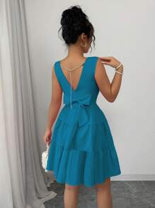 Elenzga Vestido corto de mujer de unicolor con cuello redondo, bajo con volantes, sin mangas y con amarre en la espalda - Azul - Ver 3