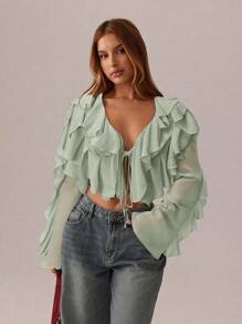SHEIN SXY Tops blancos románticos; Ropa de mujer para primavera y verano; Tops cortos; Ropa de festival y fiesta; Camisa de mujer de manga larga, escote en V profundo, transparencia y tirantes con estampado de hoja de loto, sexy - verde menta - Ver 1