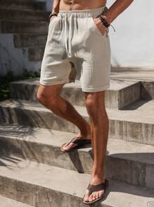 Manfinity RSRT Men's Solid Color Drawstring Waist Pockets Textured Pure Cotton Shorts Men Shorts Casual