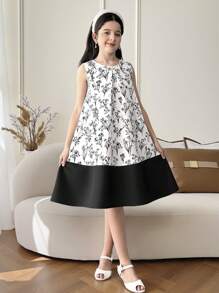 فستان من البناتالصغيرات مطبوع بالأزهار مخصر بشكل جيب مع فيونكة خلفية، سيلويت مرتفع وأنيق