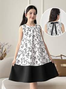 فستان من البناتالصغيرات مطبوع بالأزهار مخصر بشكل جيب مع فيونكة خلفية، سيلويت مرتفع وأنيق