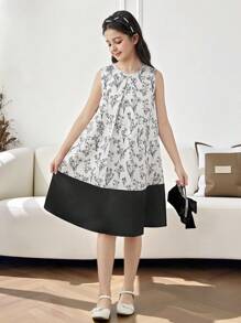 فستان من البناتالصغيرات مطبوع بالأزهار مخصر بشكل جيب مع فيونكة خلفية، سيلويت مرتفع وأنيق