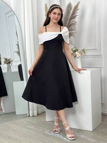 少女色块蝴蝶结前开衩吊带连衣裙