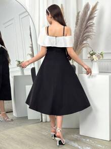 少女色块蝴蝶结前开衩吊带连衣裙