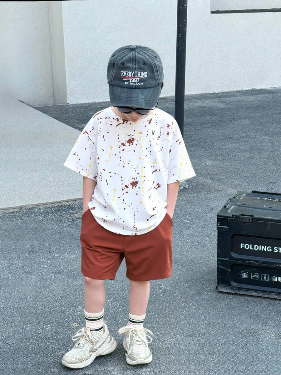 2 Piezas/Set Camiseta blanca de estampado de graffiti y pantalones cortos negros holgados para niños jóvenes, conjunto de dos piezas adecuado para primavera y verano, apropiado para la vida diaria, deportes, campus, reuniones, festivales, actuaciones, fotografía y temporada de regreso a clases. - Multicolor - Ver 1
